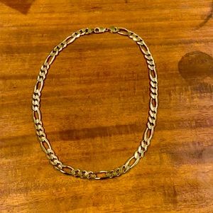 98 grams of 14k gold, diamond cut figaro necklace